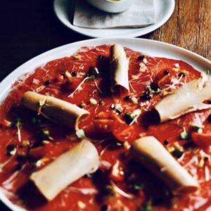 Carpaccio de presa ibérica y foie con lámina de parmesano y aceto balsámico